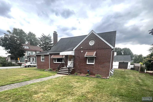 a front view of house with yard