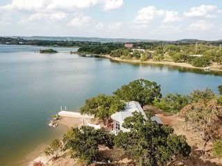 a view of a lake with a city