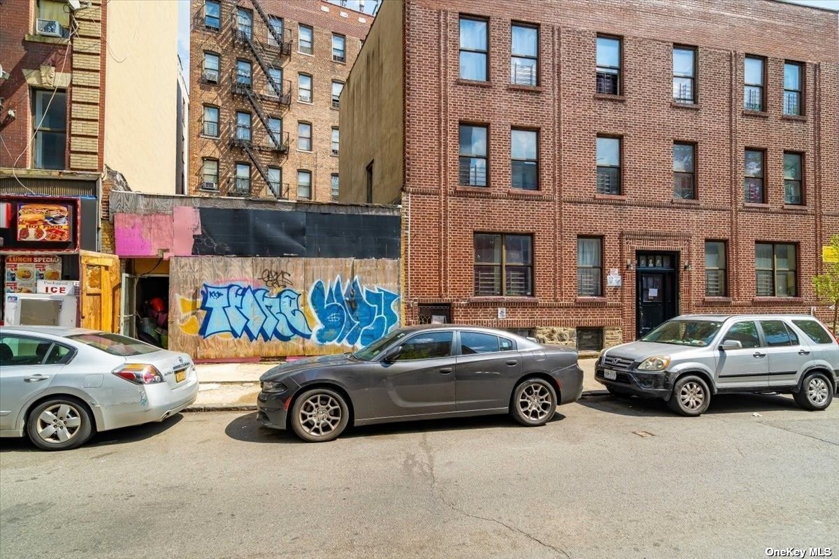 a view of a car parked in front of a building