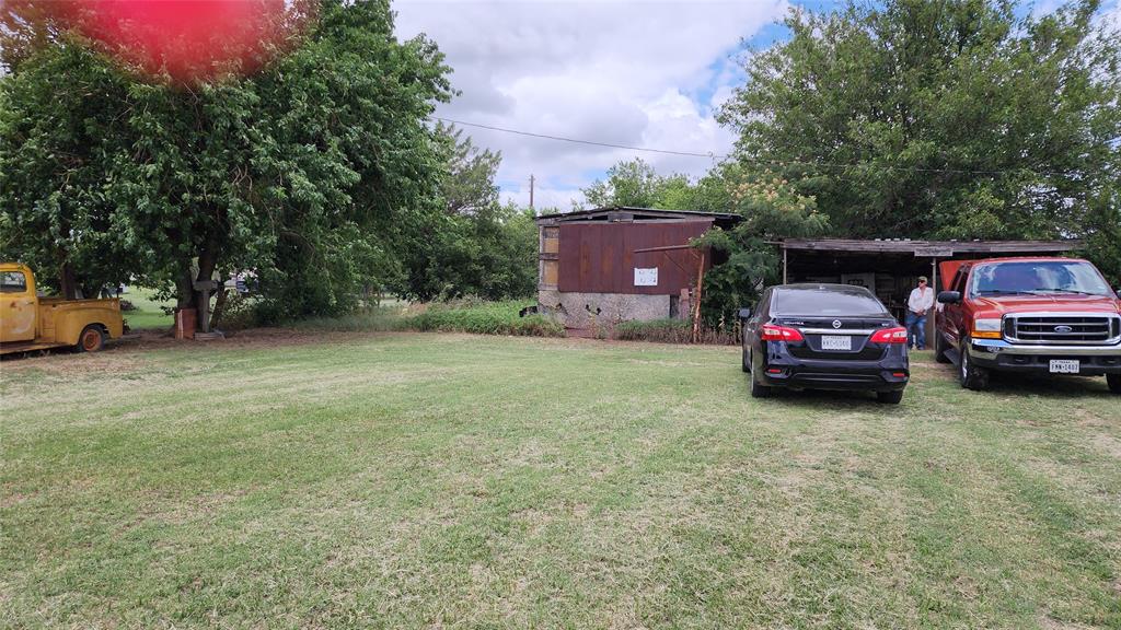 a car parked in front of a house