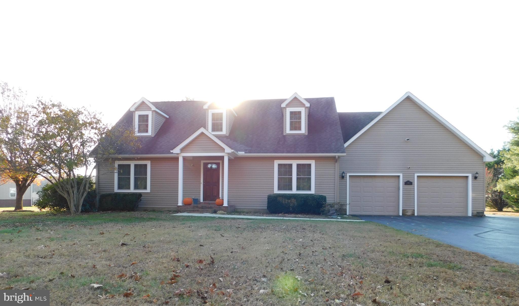 a view of a yard in front of a house