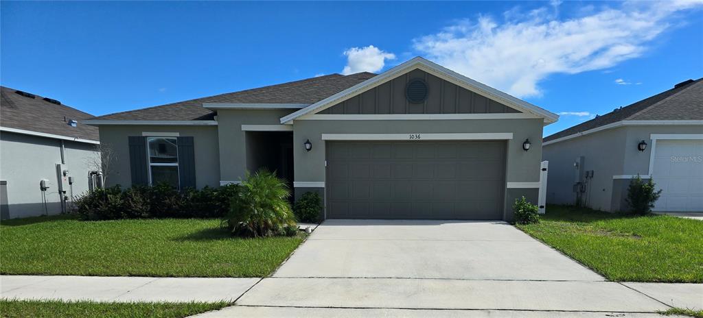 a front view of house with yard