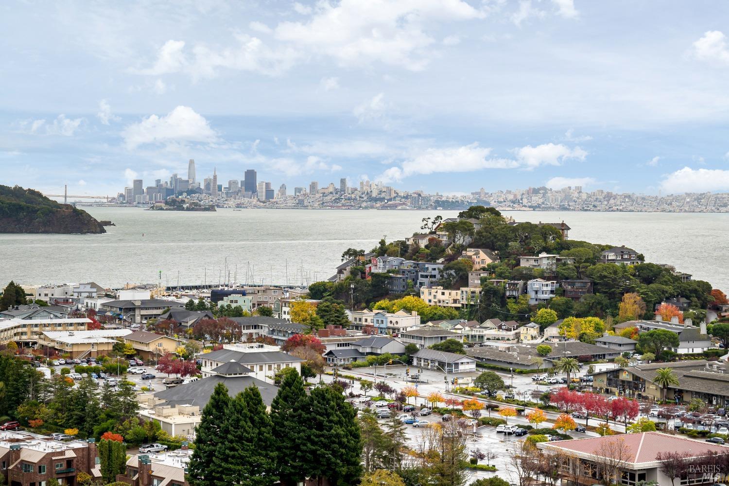 Welcome to 45 Harbor Oak Drive, Unit #22, complete with sweeping views of the city skyline over Downtown Tiburon.