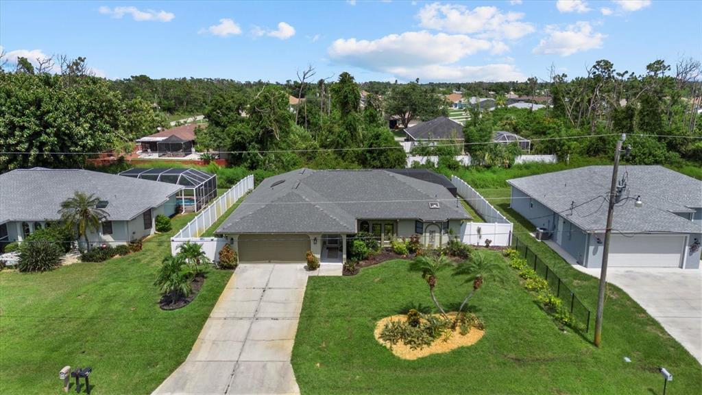 a aerial view of a house with garden