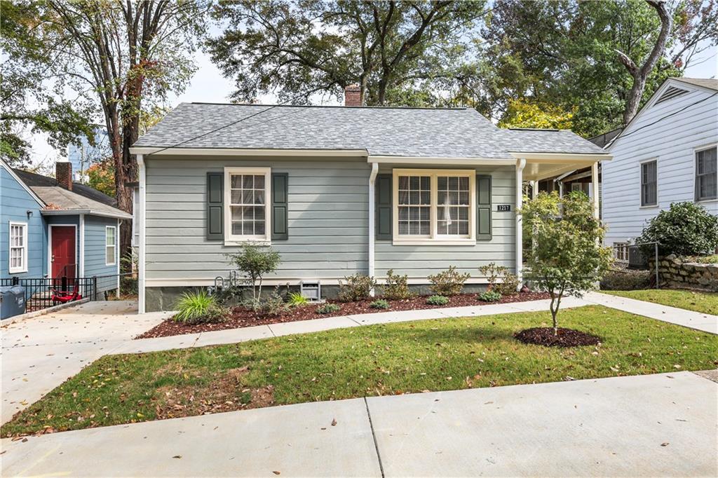 front view of a house with a yard