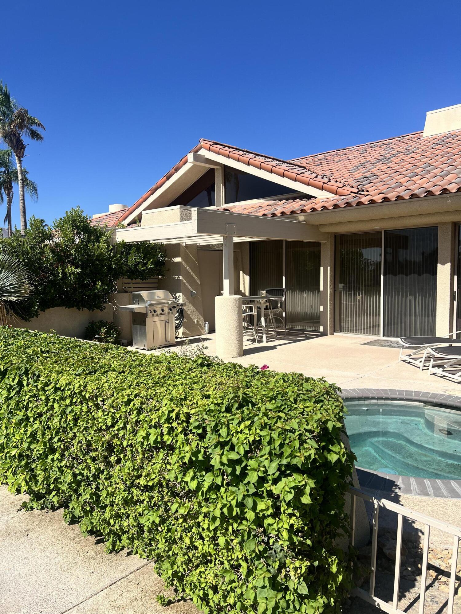 a front view of a house with patio