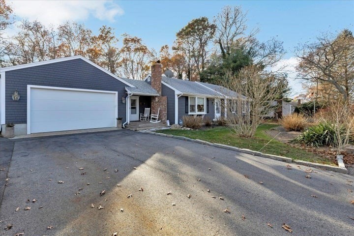 front view of a house with a street