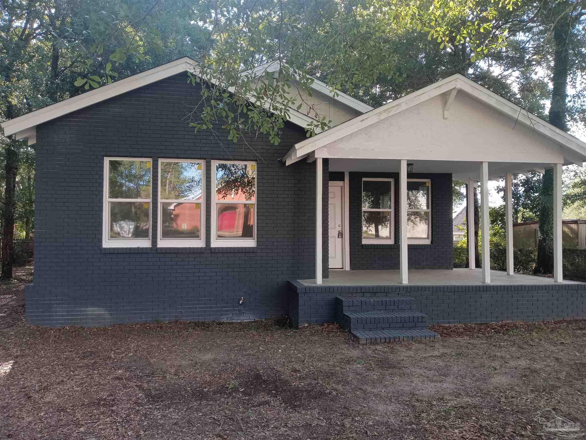 a front view of a house with porch