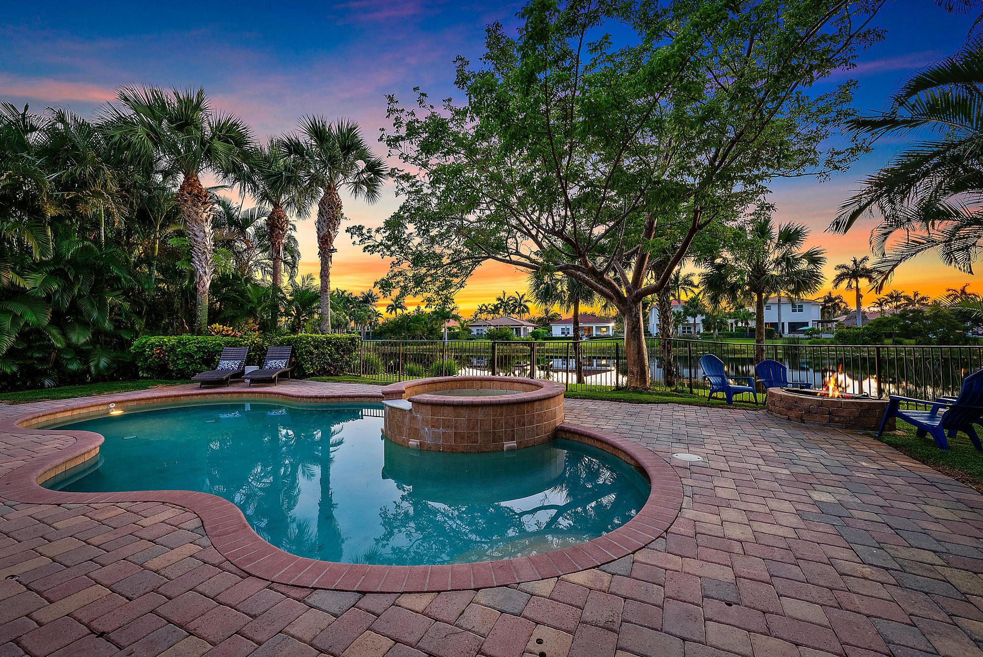 a view of a swimming pool with a patio