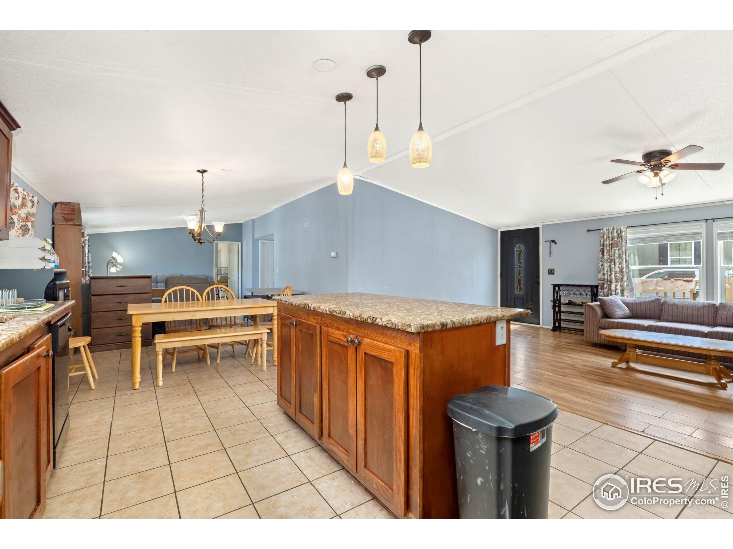 a open kitchen that has a lot of cabinets in it