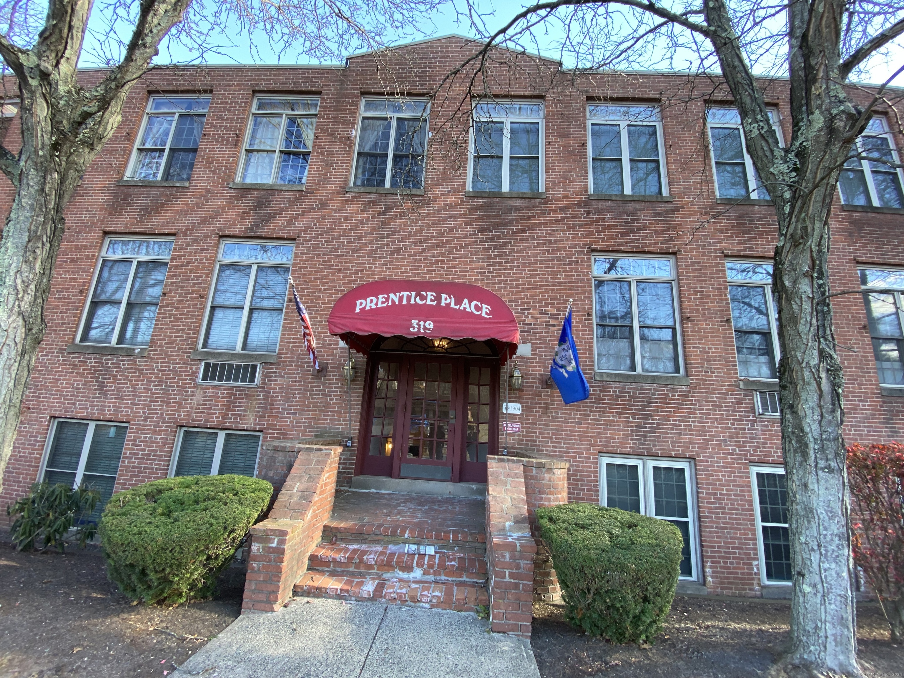 a front view of a multi story residential apartment building