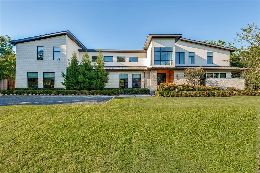 a front view of a house with swimming pool