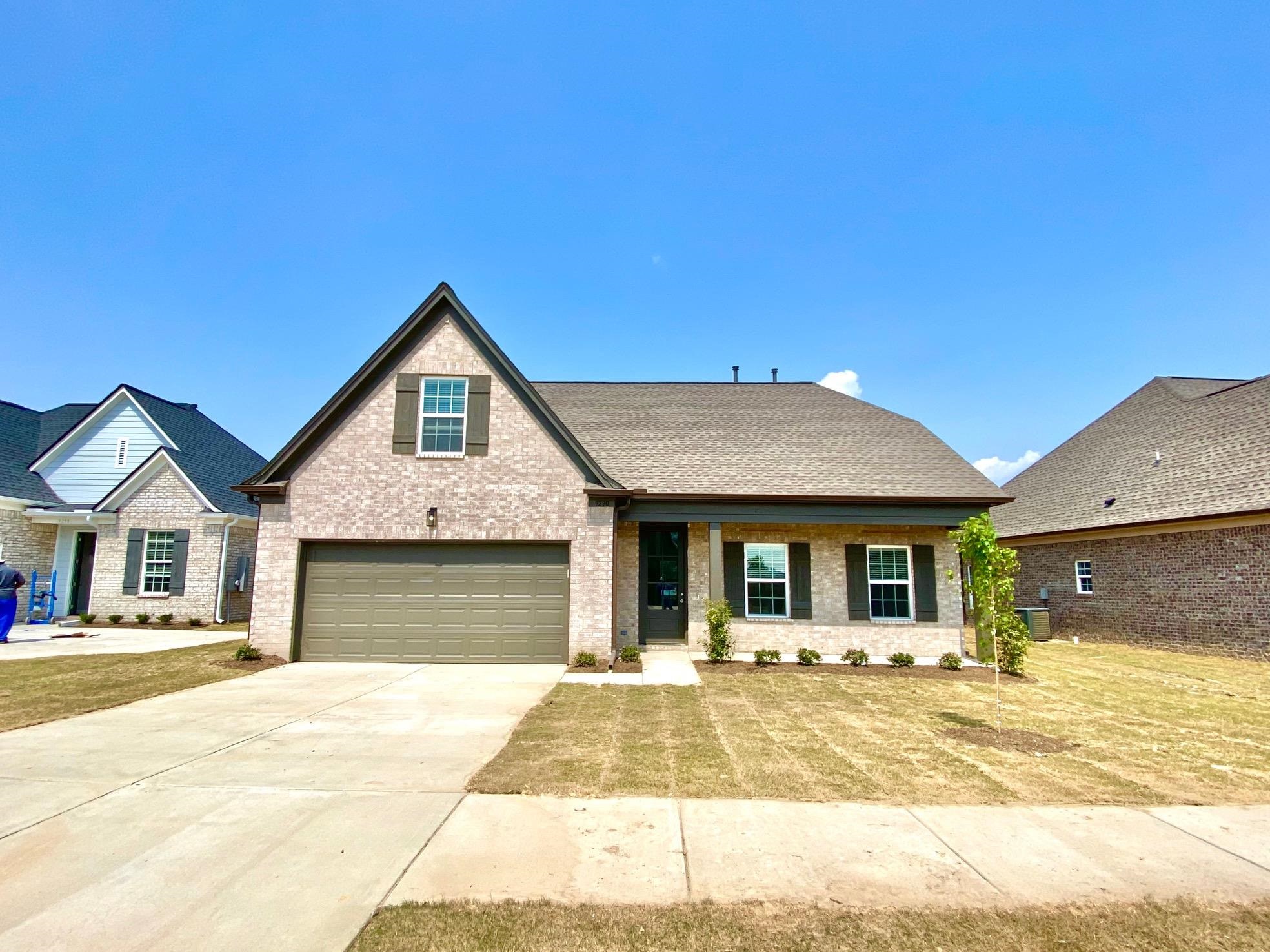 View of front of house featuring a front lawn