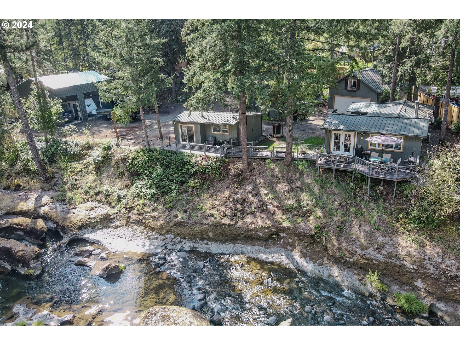 a aerial view of a house with a yard