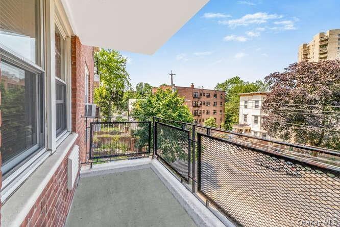 a view of a balcony with city view