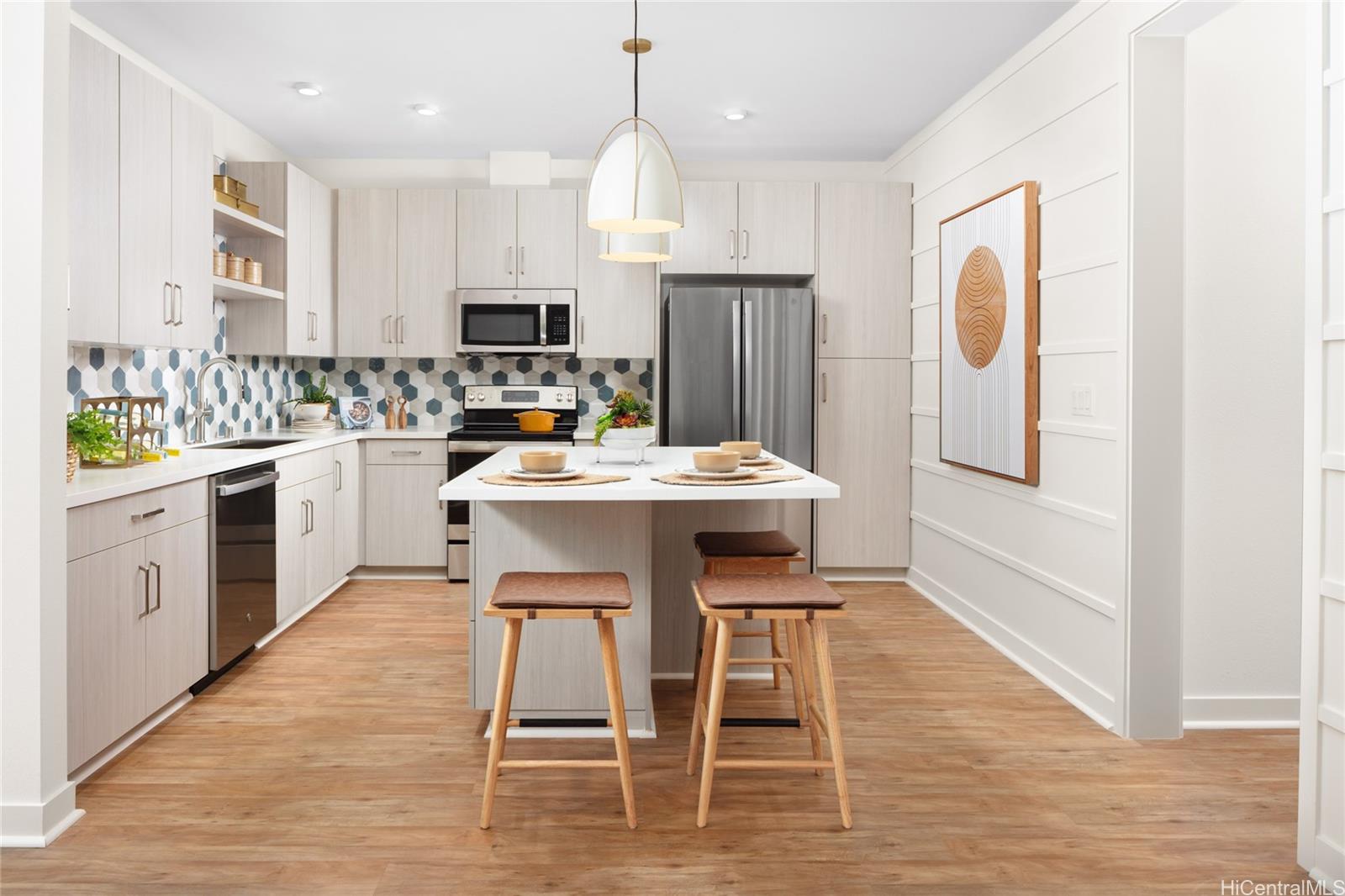 a kitchen with a table chairs refrigerator and microwave