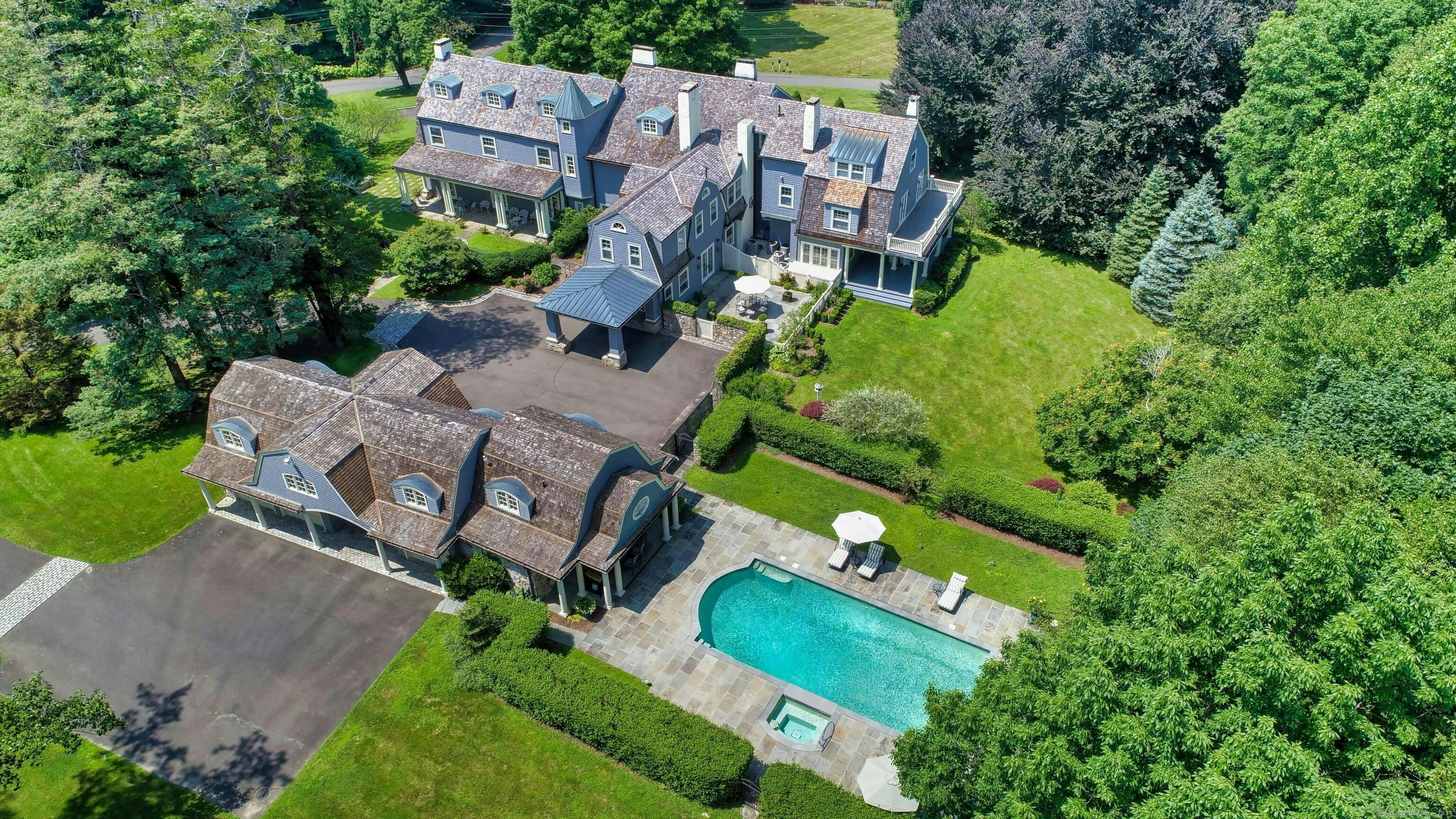 an aerial view of multiple houses with yard