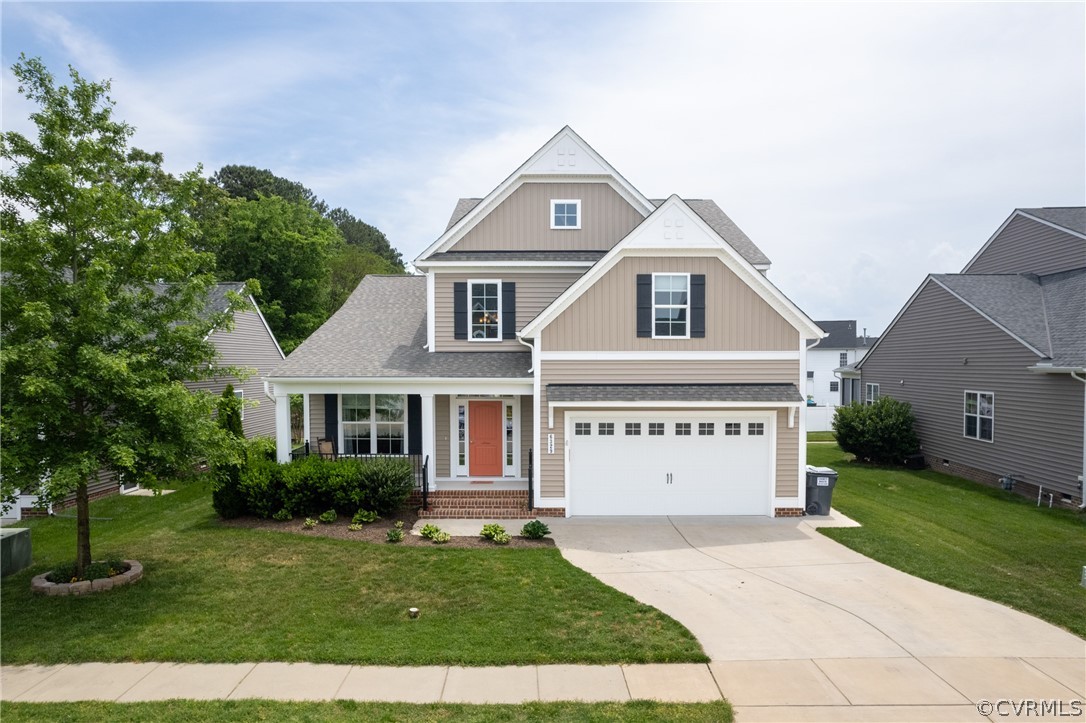 front view of a house with a yard