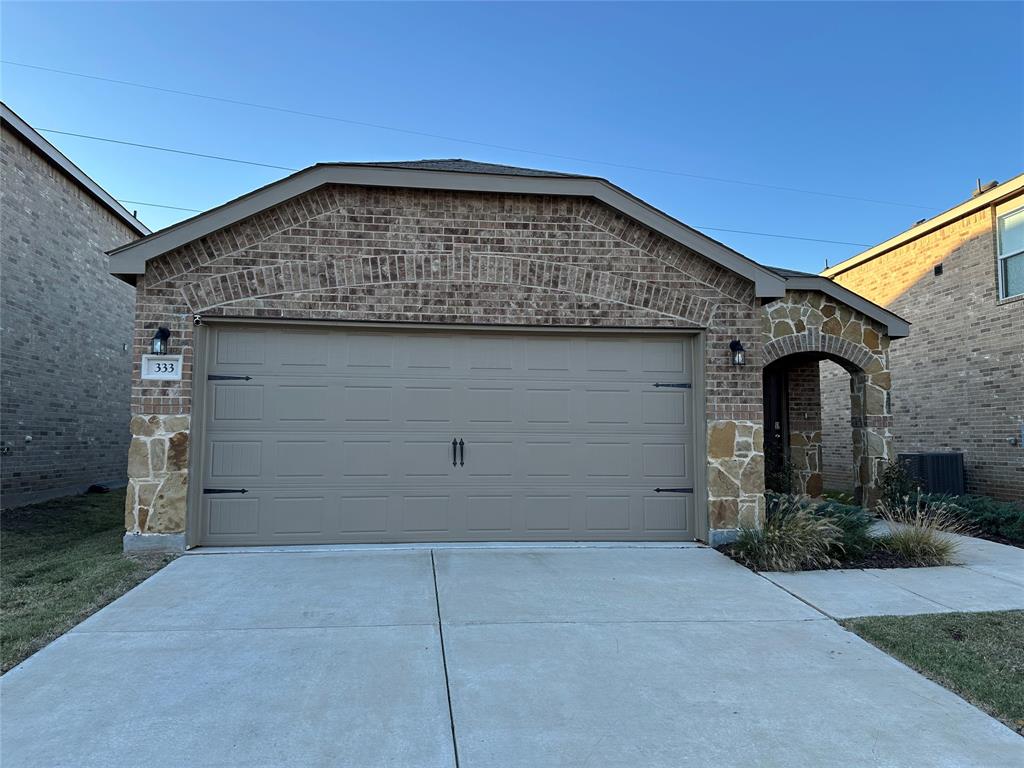 a view of a house with garage