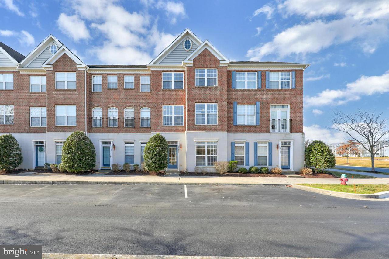 a front view of multi story residential apartment building