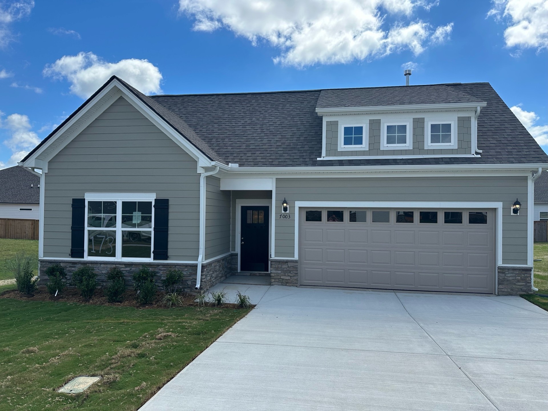 front view of house with a yard