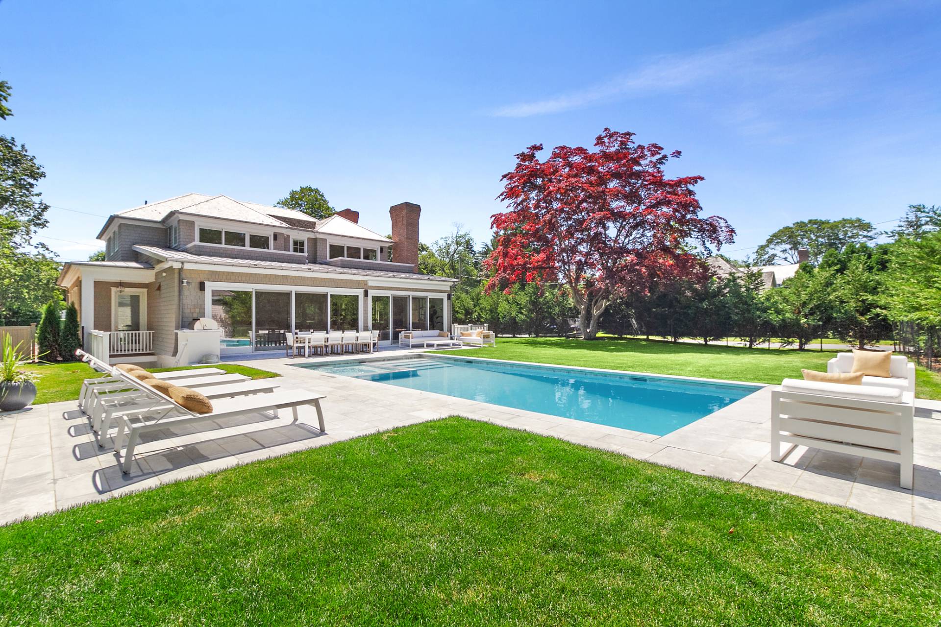 a house with garden in front of it