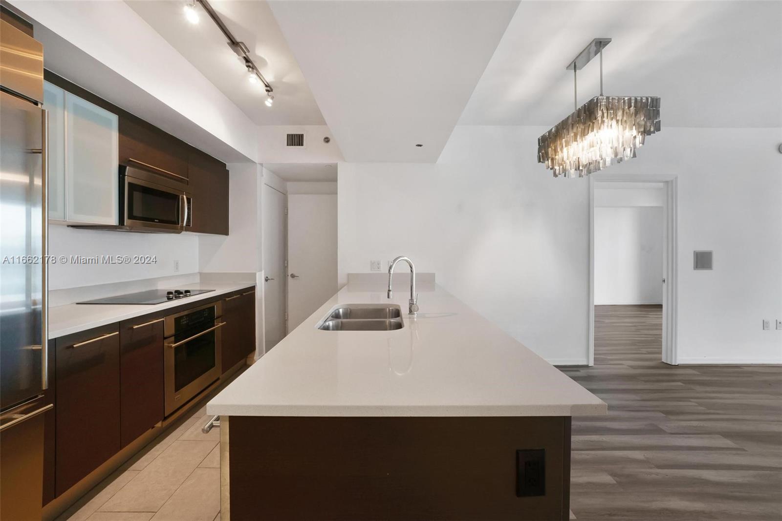 a kitchen with a stove and a microwave