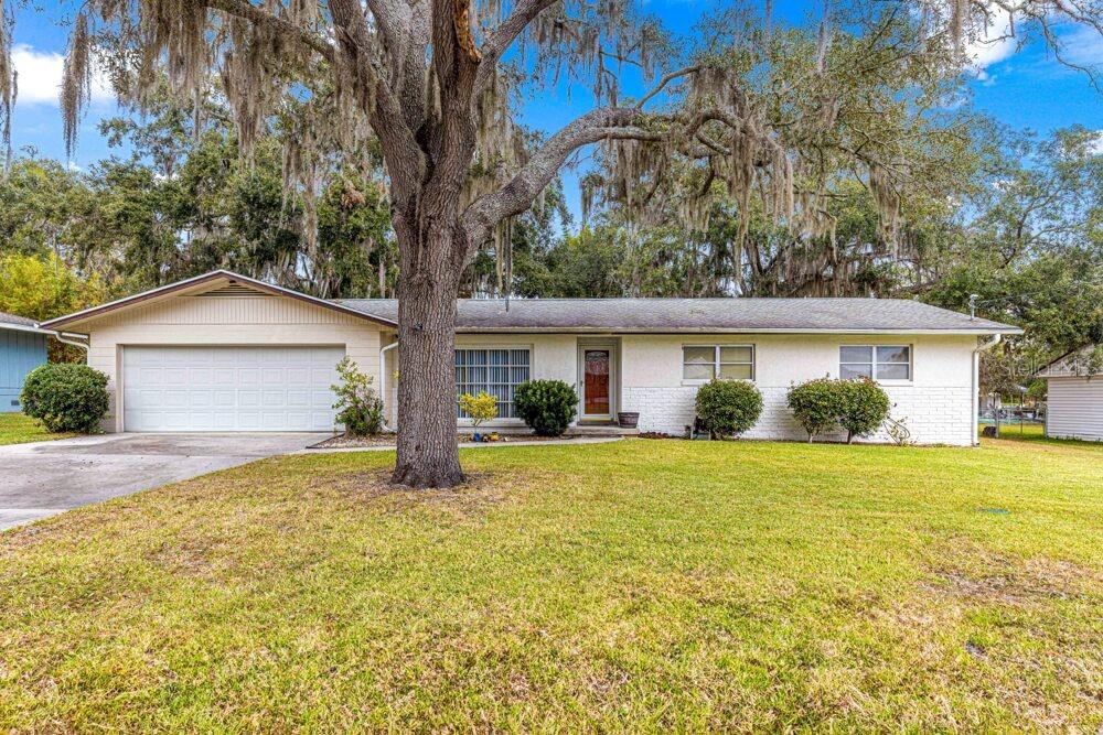 front view of a house with a big yard