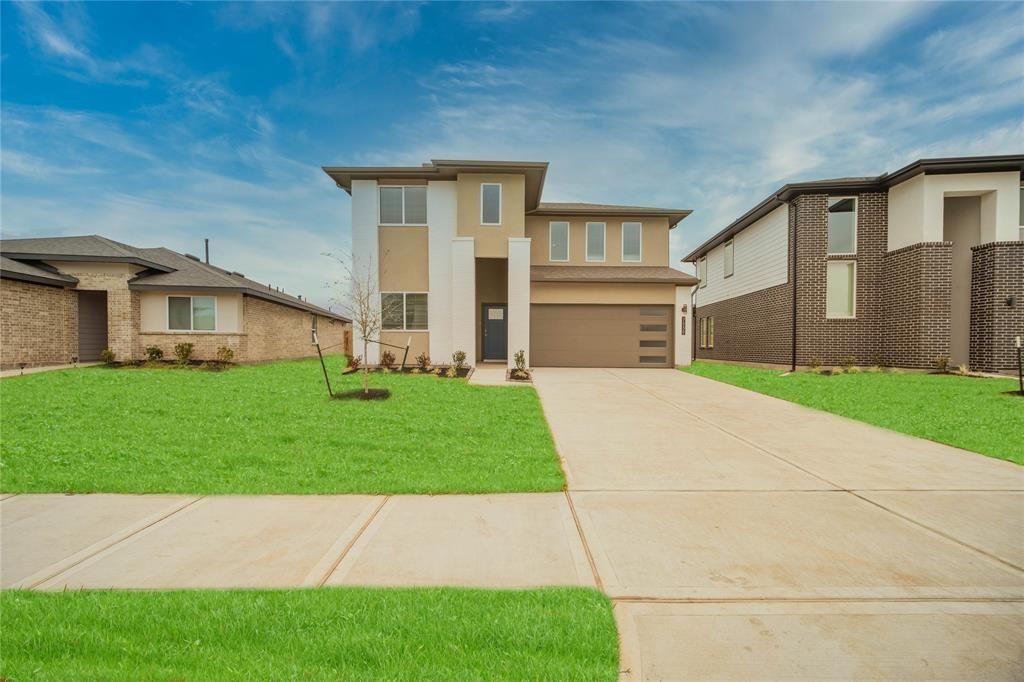 a front view of house with yard