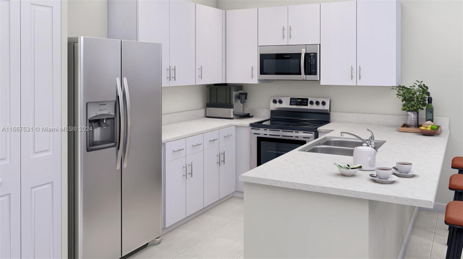 a kitchen with stainless steel appliances a refrigerator sink and white cabinets