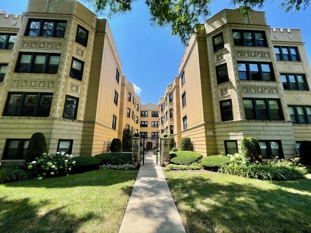 a front view of multi story residential apartment building