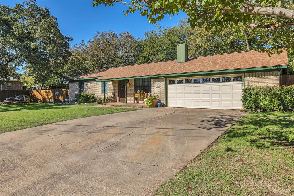 a view of house with yard