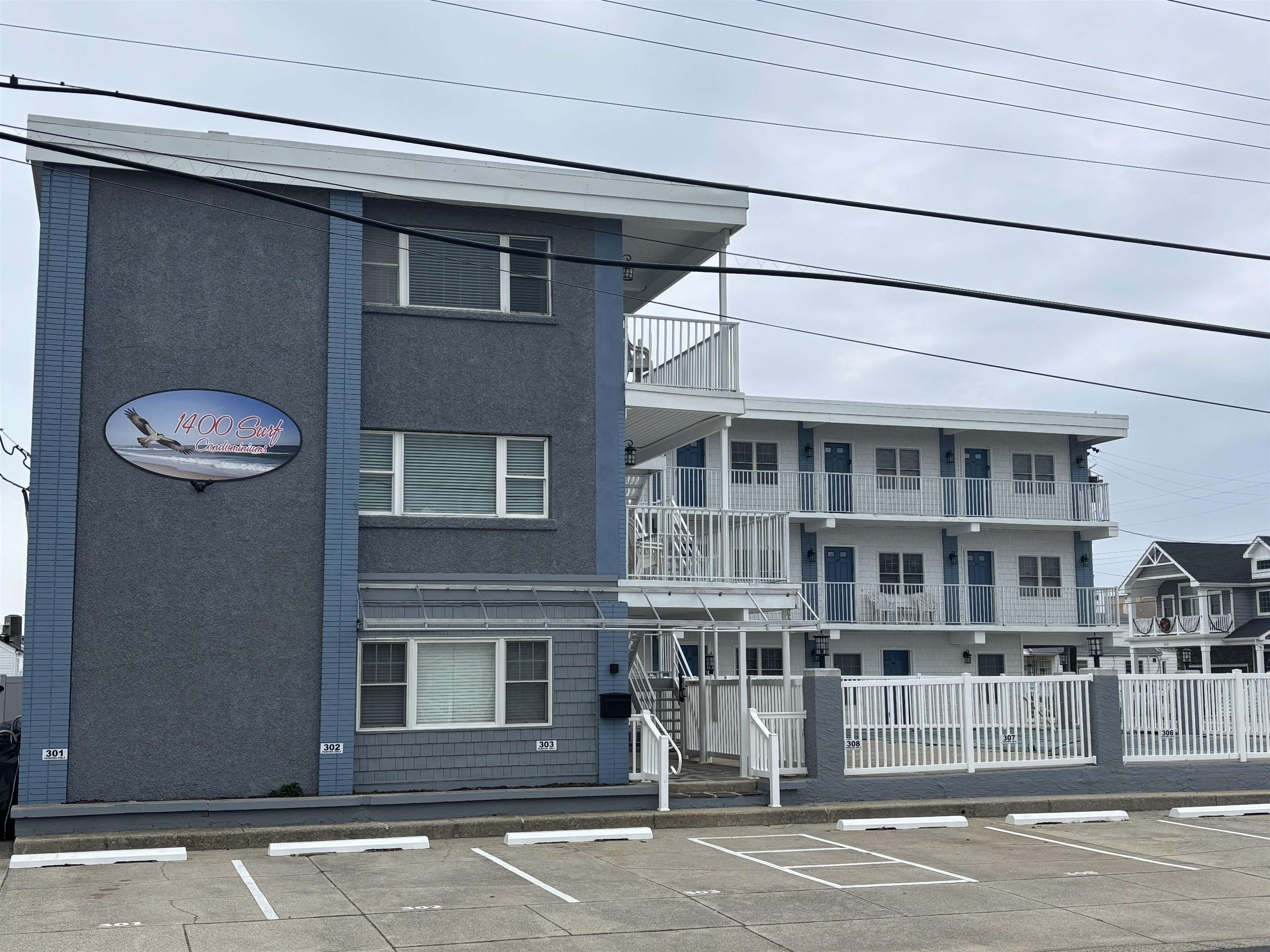 a front view of a building with a street