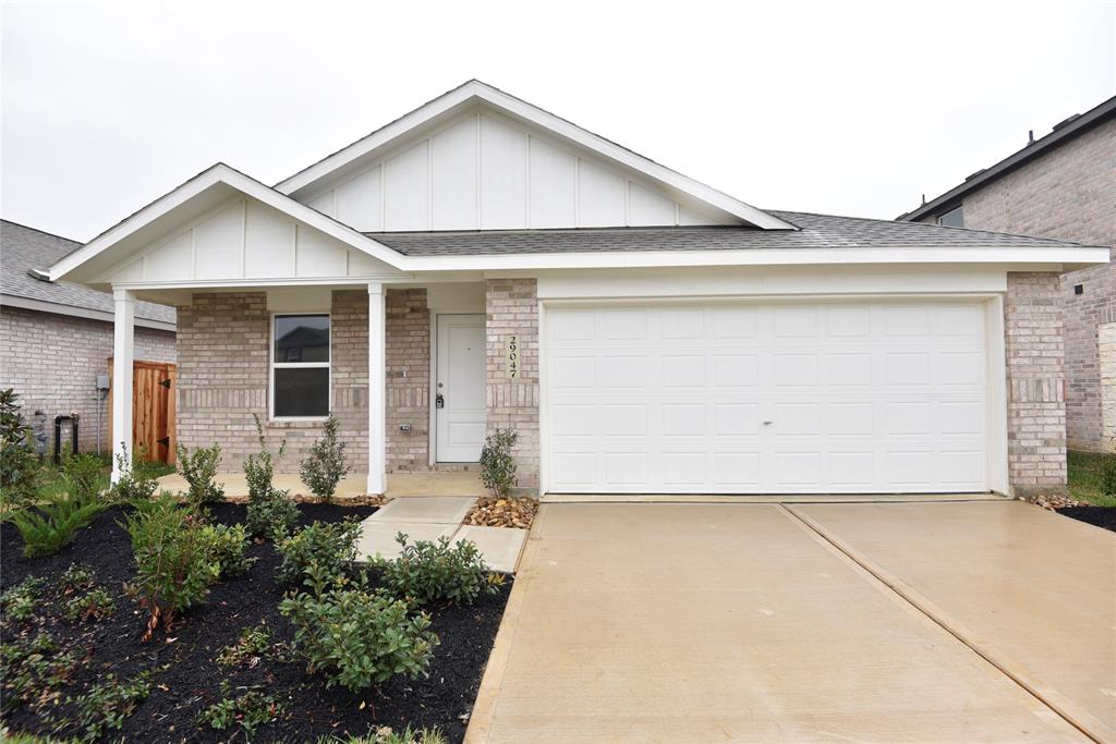 a front view of house with garage