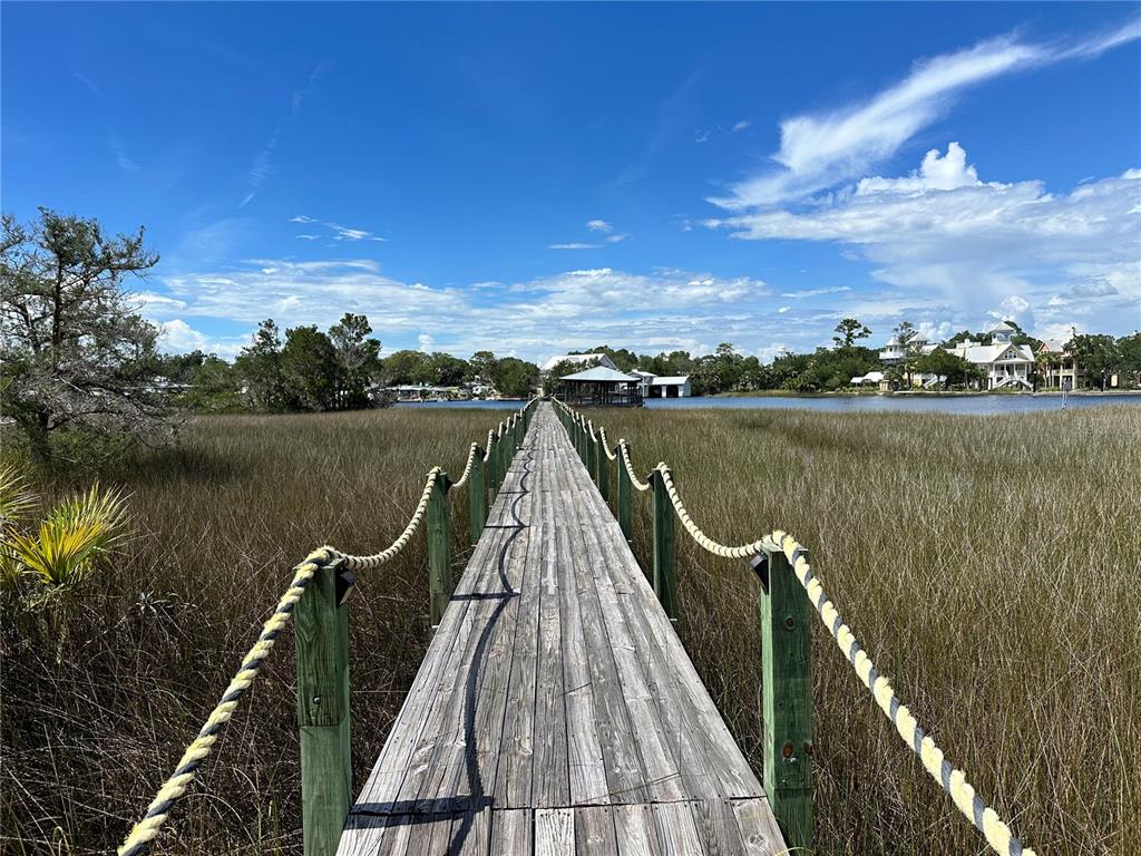 a view of wooden floor with a lake