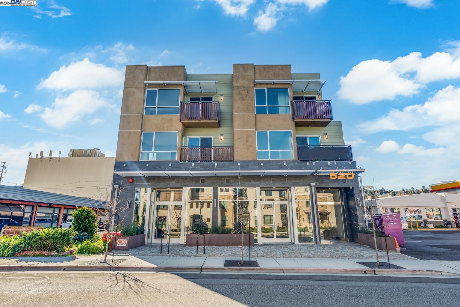 a front view of a building with street view