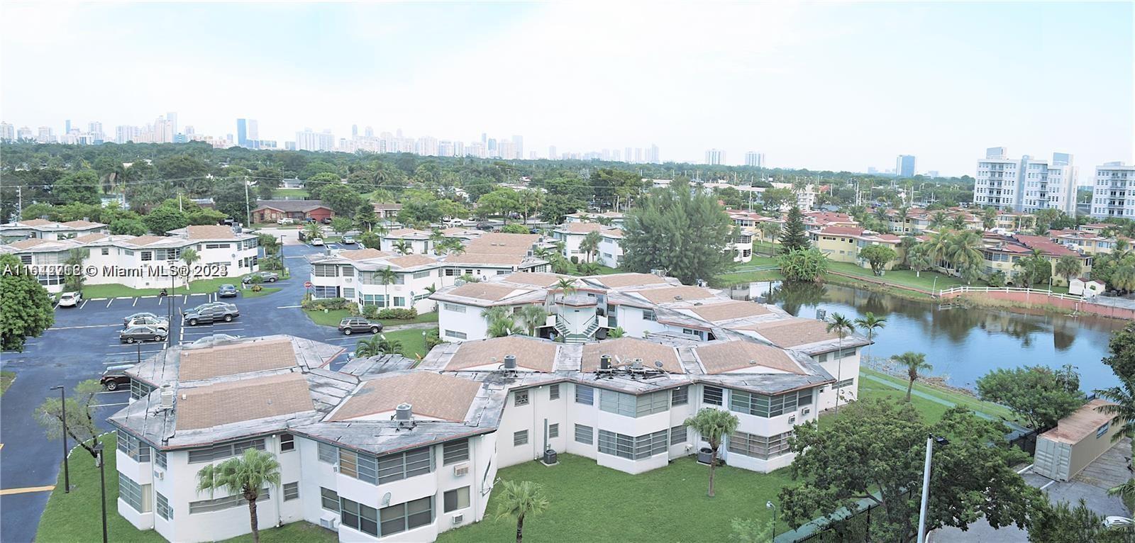 a view of a city with tall buildings