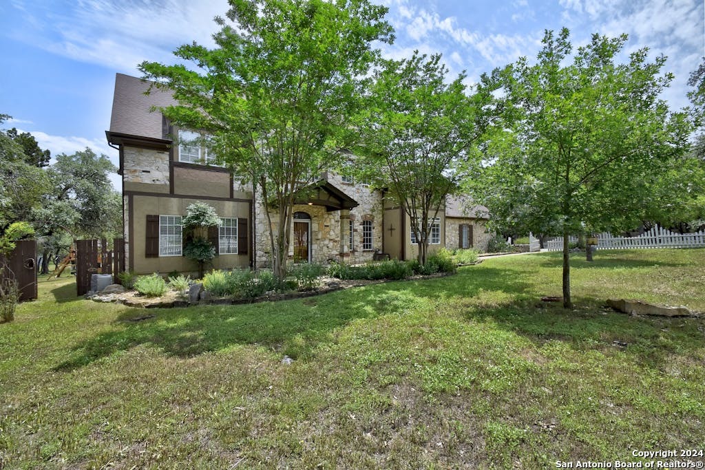 a house view with a garden space