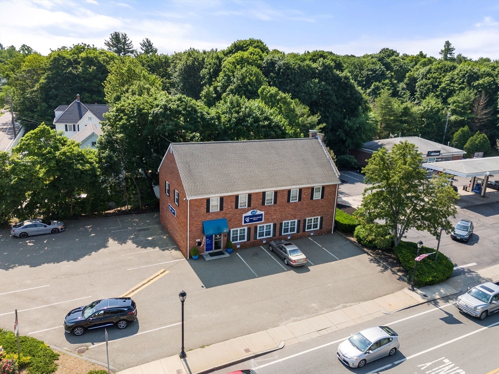 an aerial view of a house with porch garden