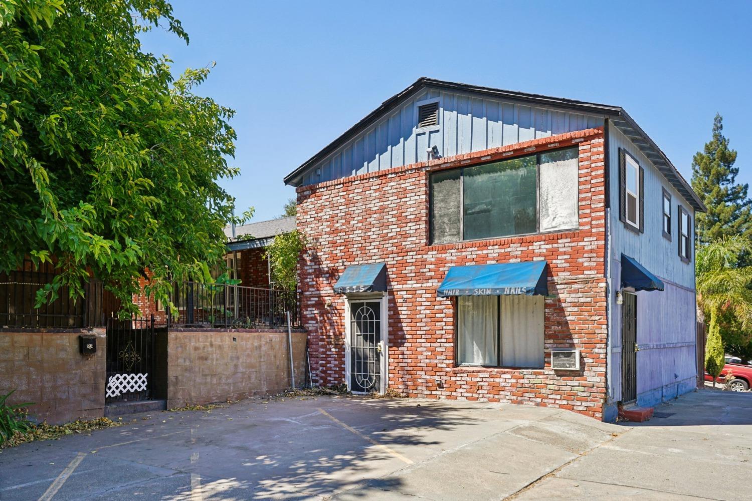 a front view of a house with a garage