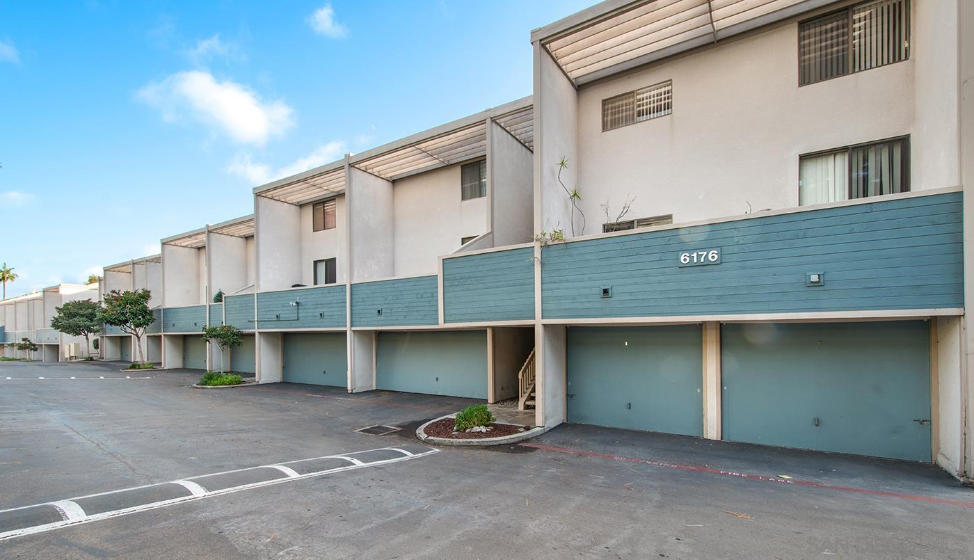 a view of an outdoor space with a car parking garage