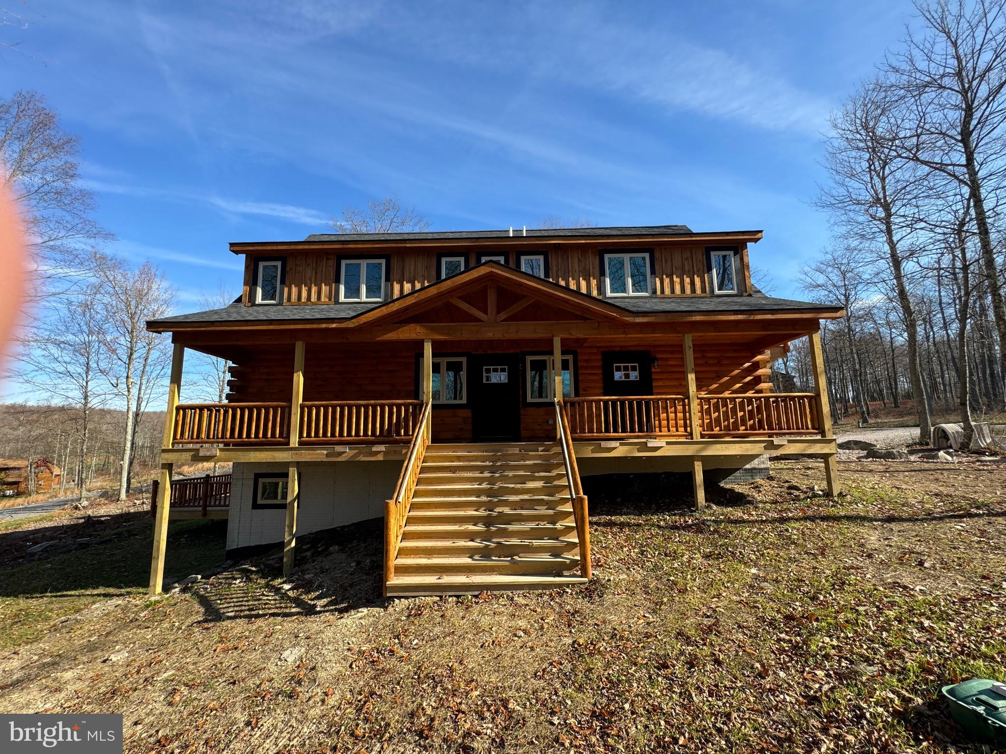 a front view of a house with a porch