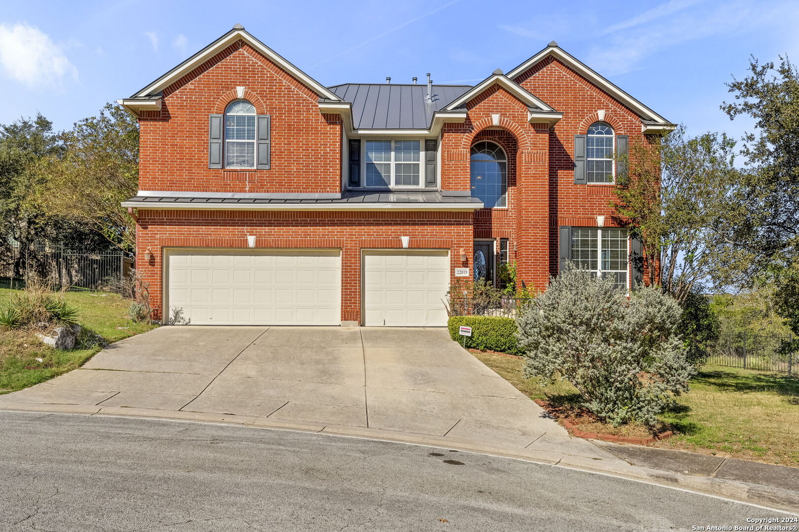 front view of house with a yard