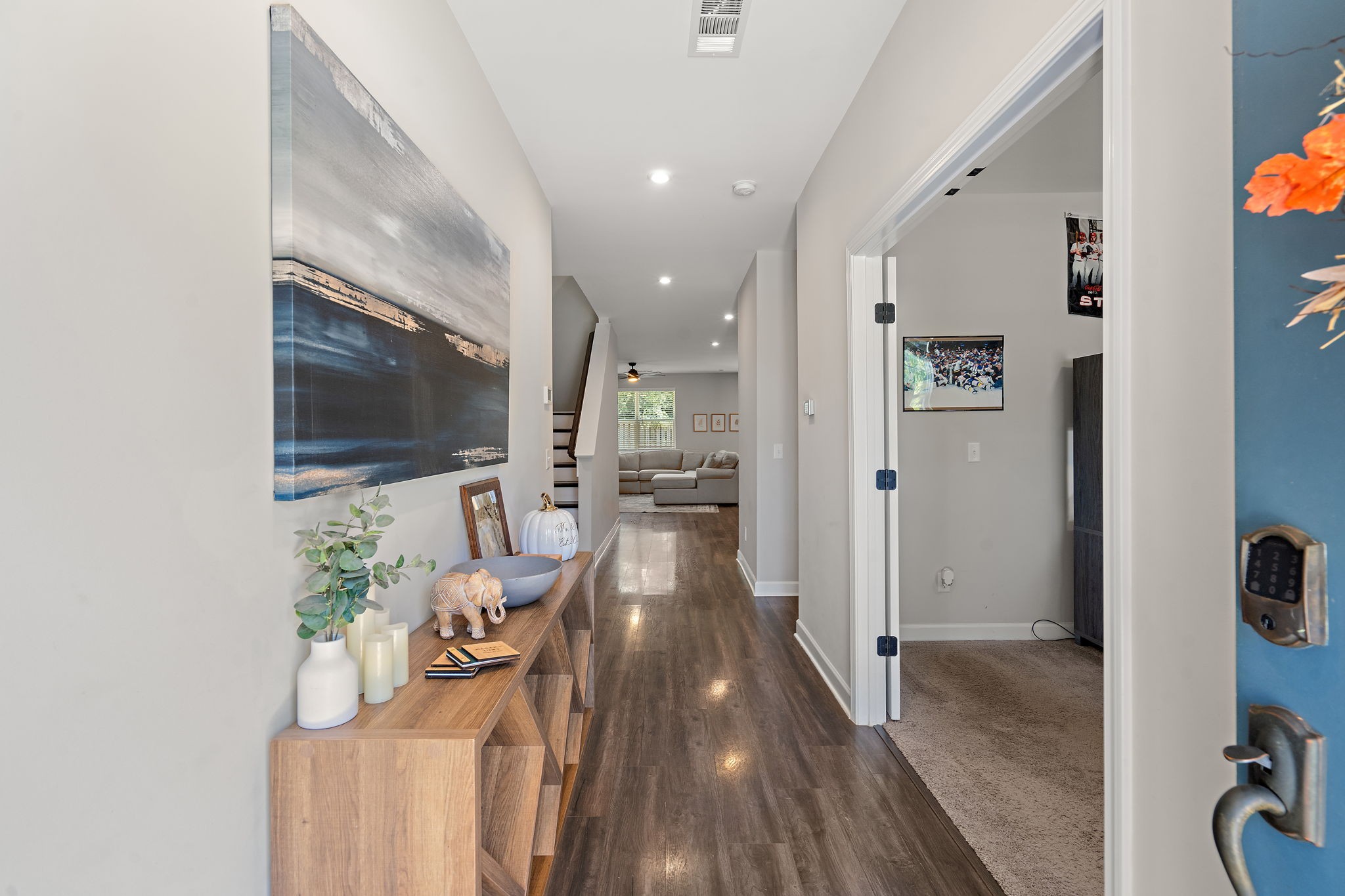 a view of a living room with a flat screen tv