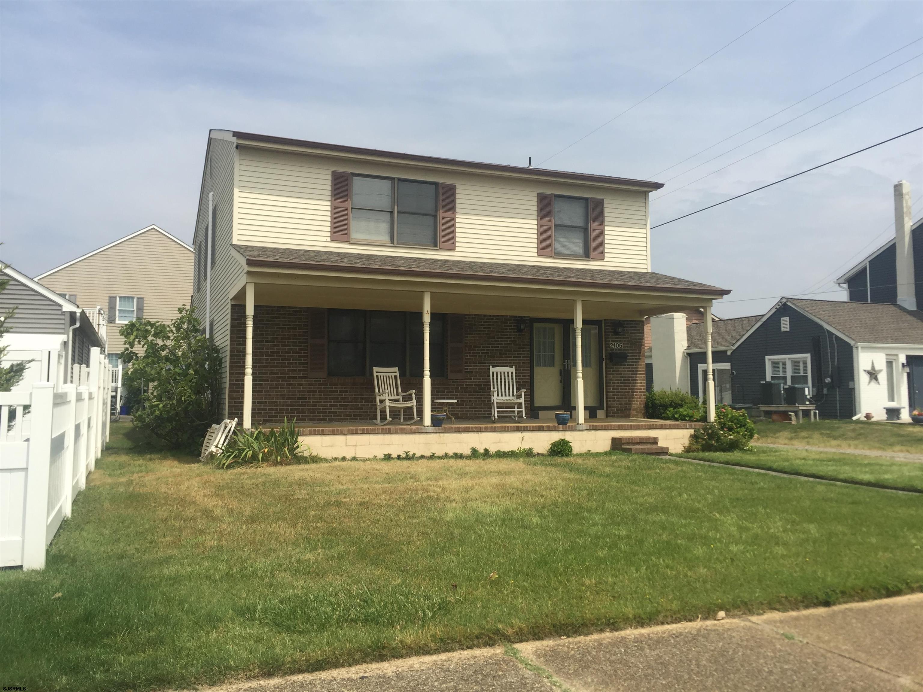 front front view of a house with a yard