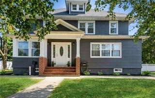 View of front of home with a front yard