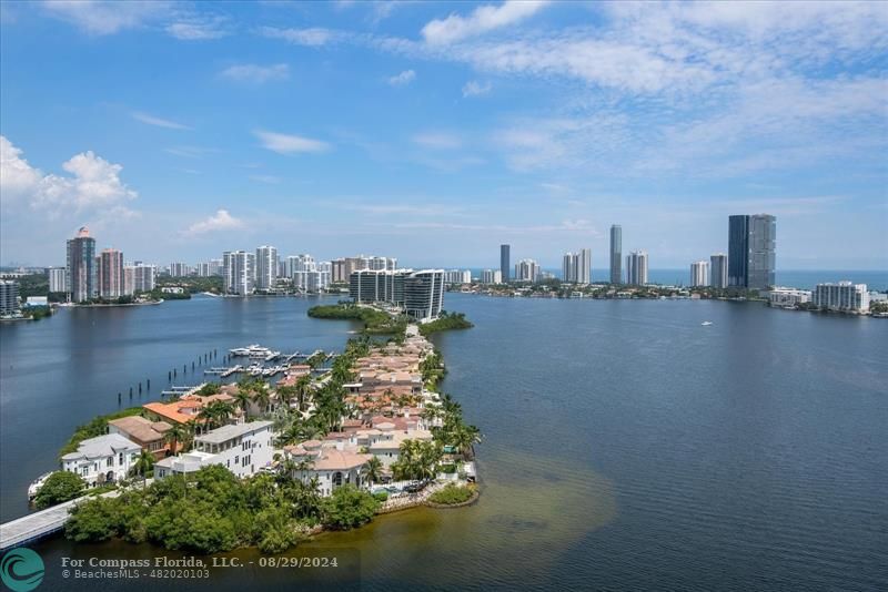 a view of a city and lake