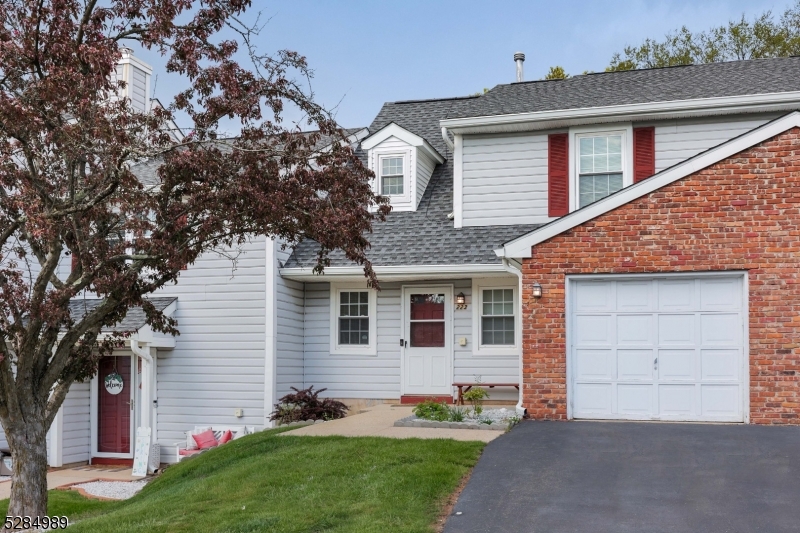 a front view of house with yard