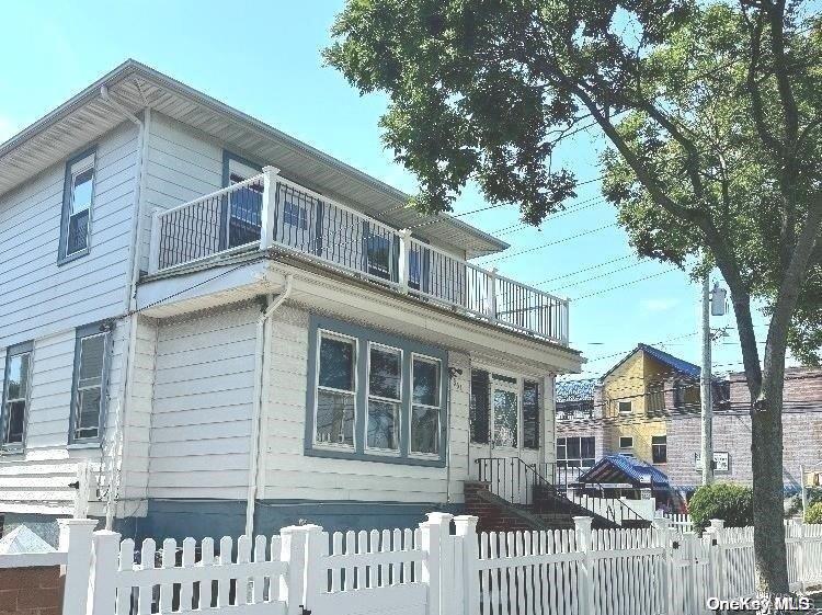 a front view of a house with a porch