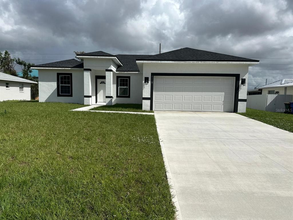 front view of a house with a yard